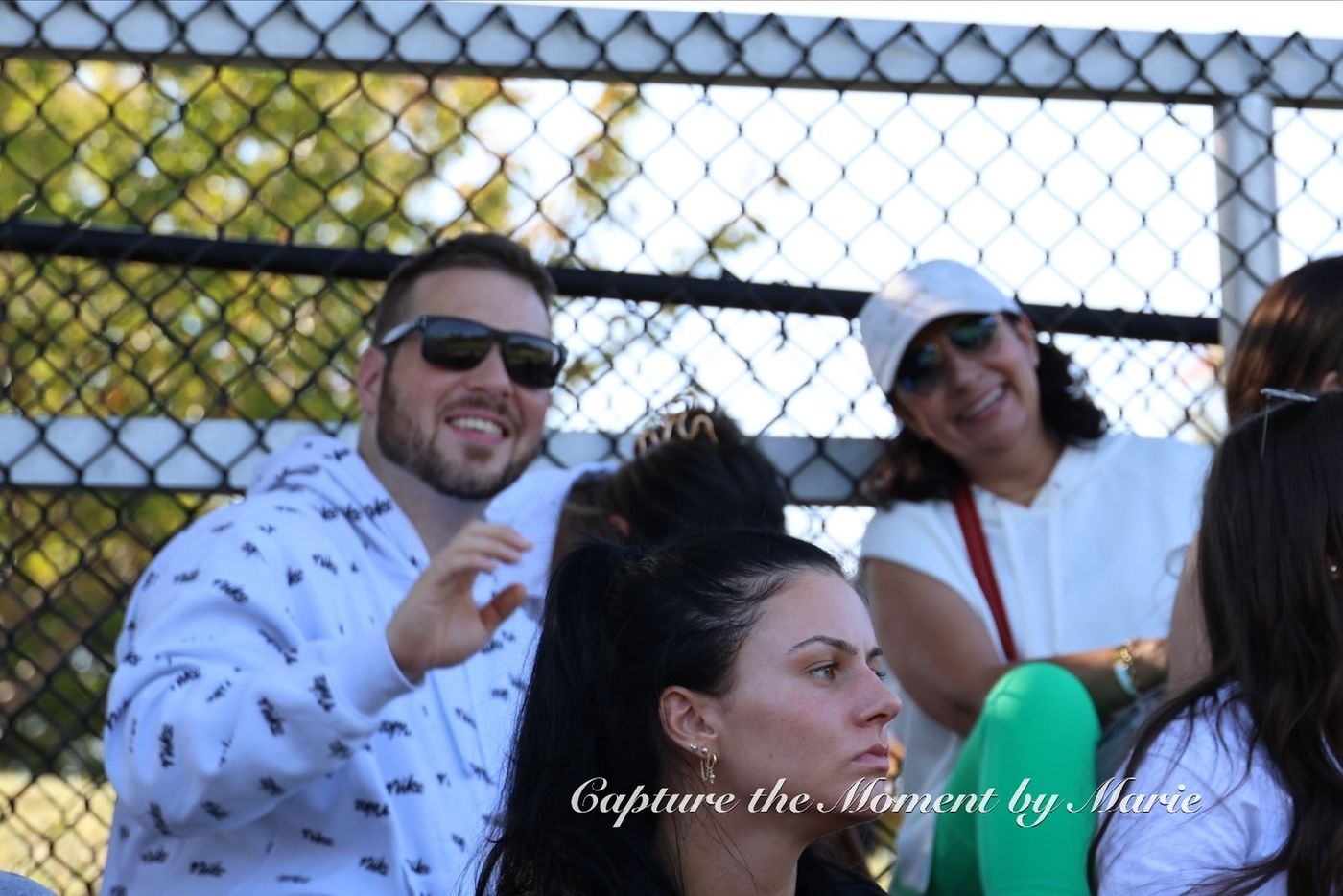 Supporters gathered along the fence at the 2025 Finals Celebration.