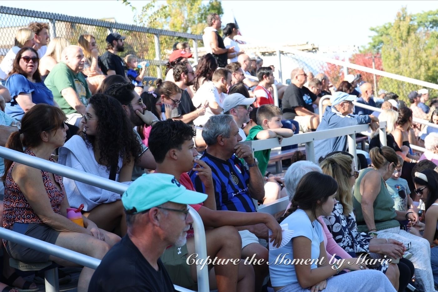 A packed set of bleachers at the 2025 Finals Celebration.