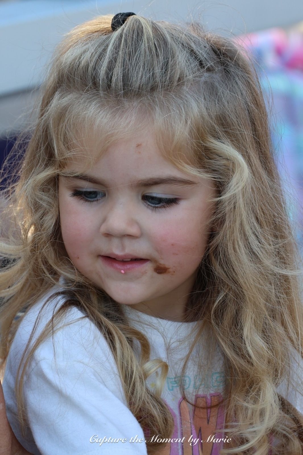 A young supporter enjoying the afternoon at the 2025 Finals Celebration.