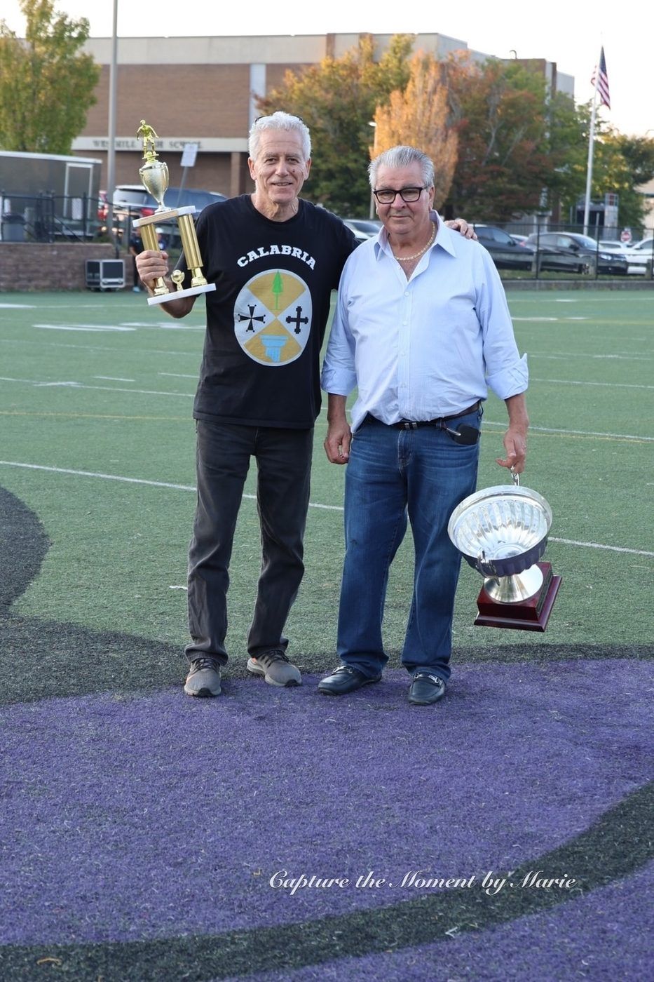 George Papallo and Council of Italian American Organizations President Luciano Siciliano presenting trophies at the 30th Anniversary Finals Celebration