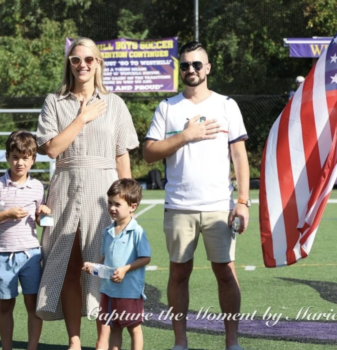 Christopher Papallo and Mayor Caroline Simmons during the national anthem at the Stamford Italian Soccer League 30th Anniversary Finals Celebration