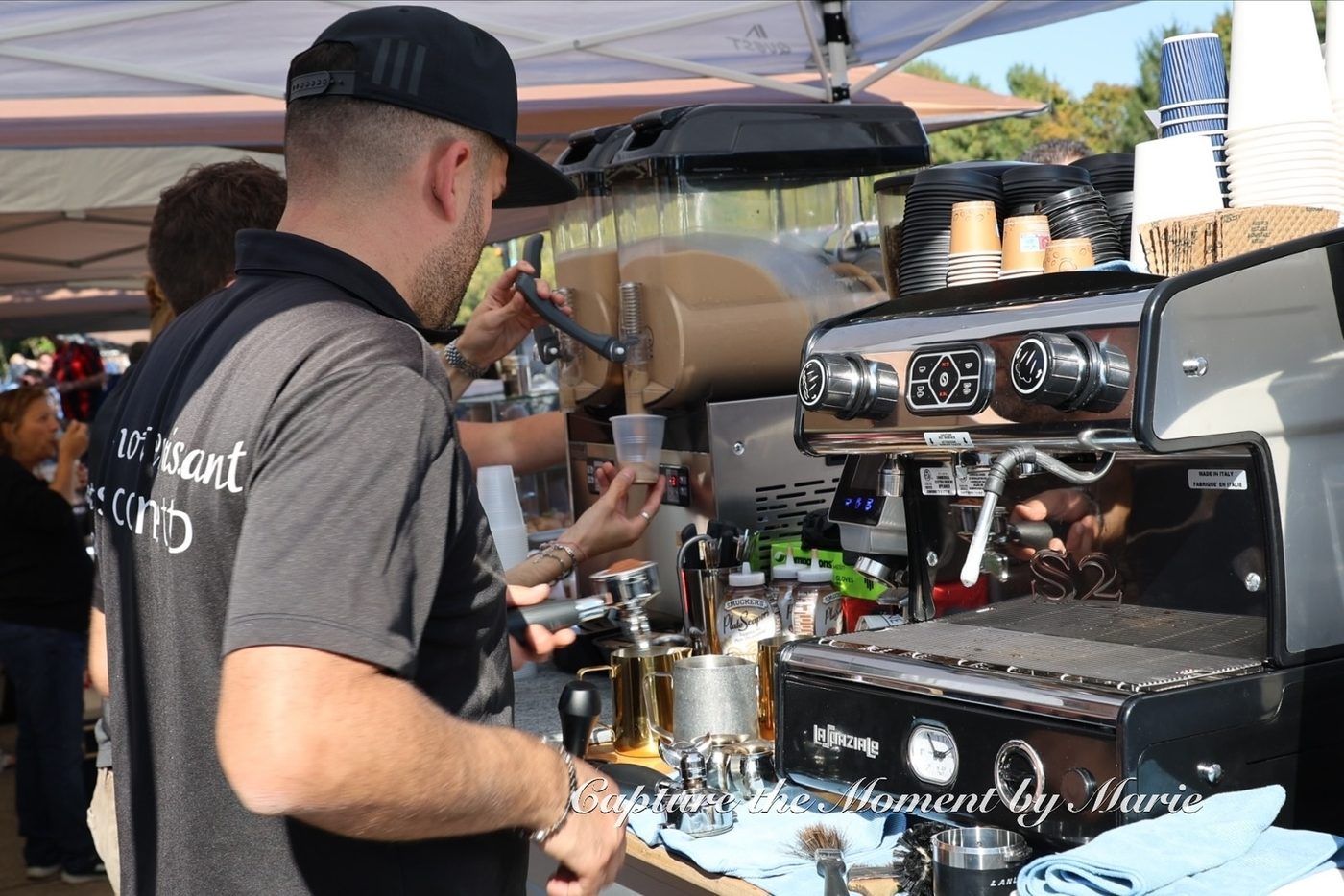 Pausa Caffe pouring coffee at its espresso bar during the 30th Anniversary Finals Celebration